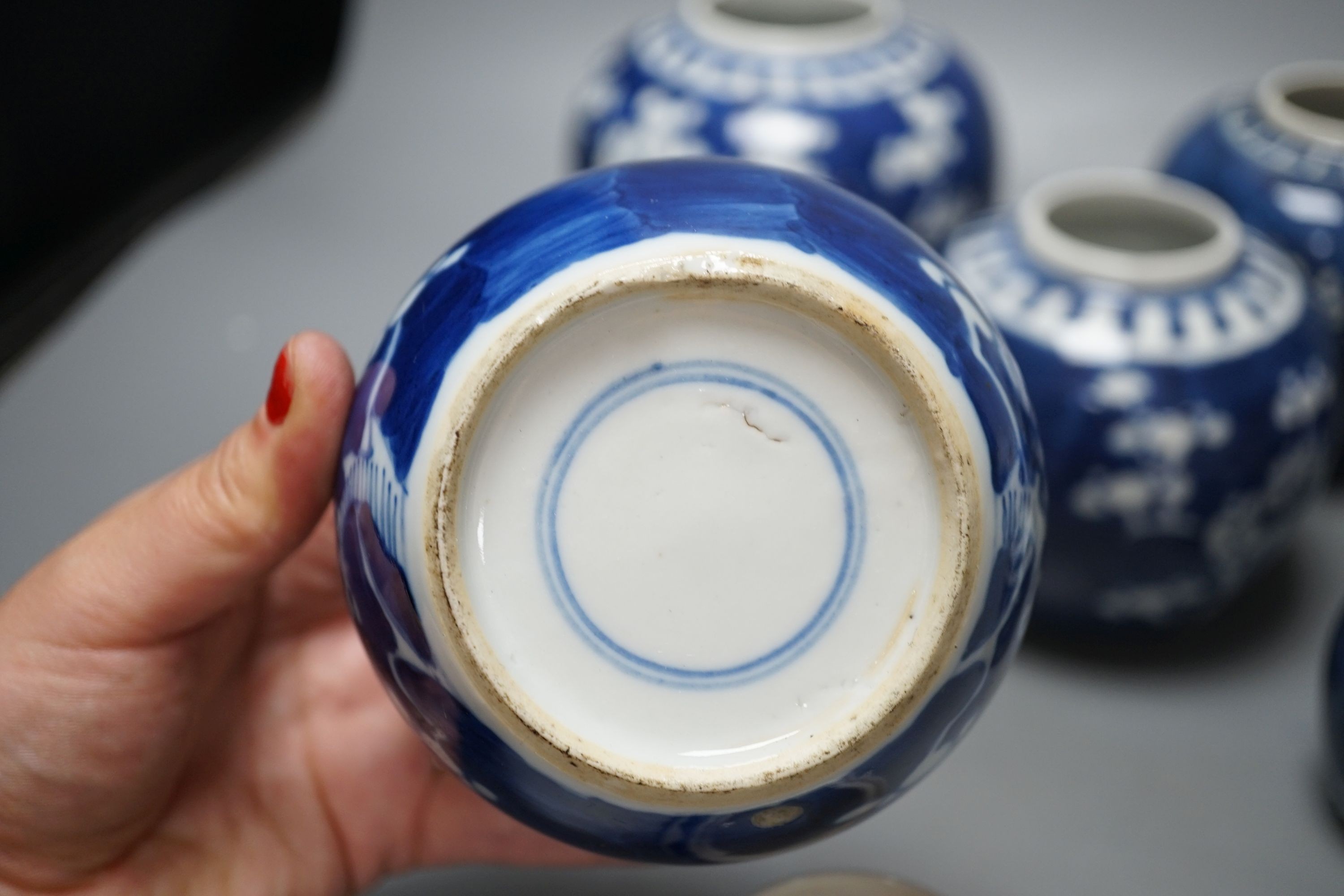 Six Chinese blue and white prunus jars and two similar pots - tallest 13cm